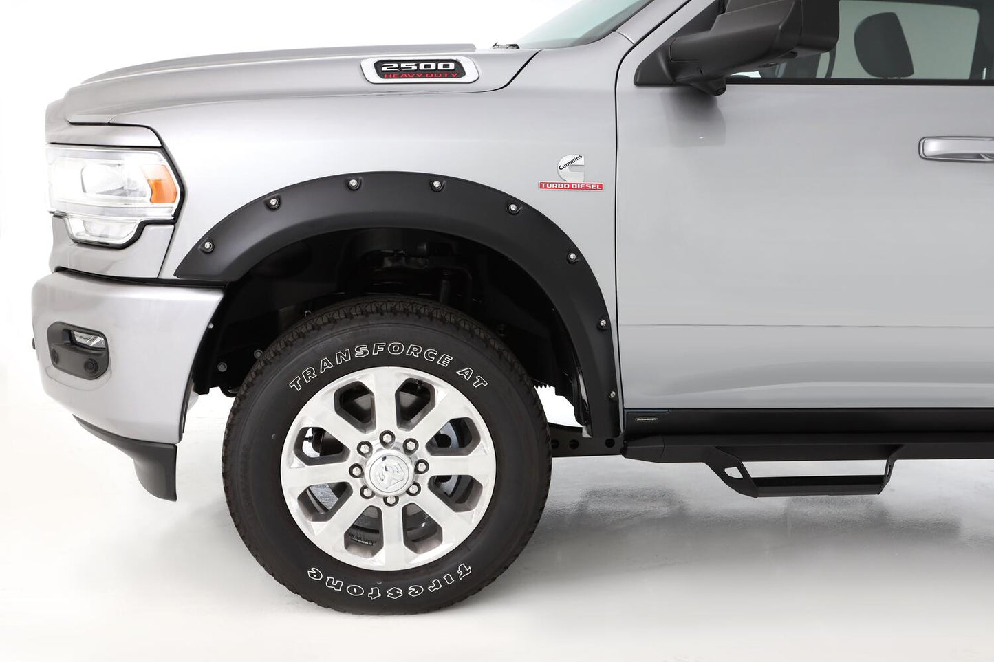 Black Pocket/Rivet Style Smooth Finish Front Fender Flares For 2019-2026 Ram 2500/3500, Includes Dually Bushwacker