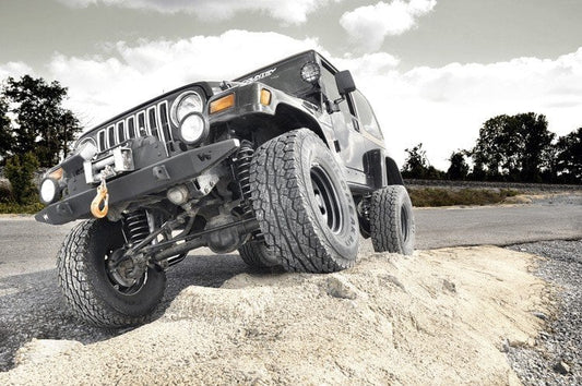 4 Inch Lift Kit M1 Jeep Wrangler TJ 4WD (1997-2002) Rough Country-1