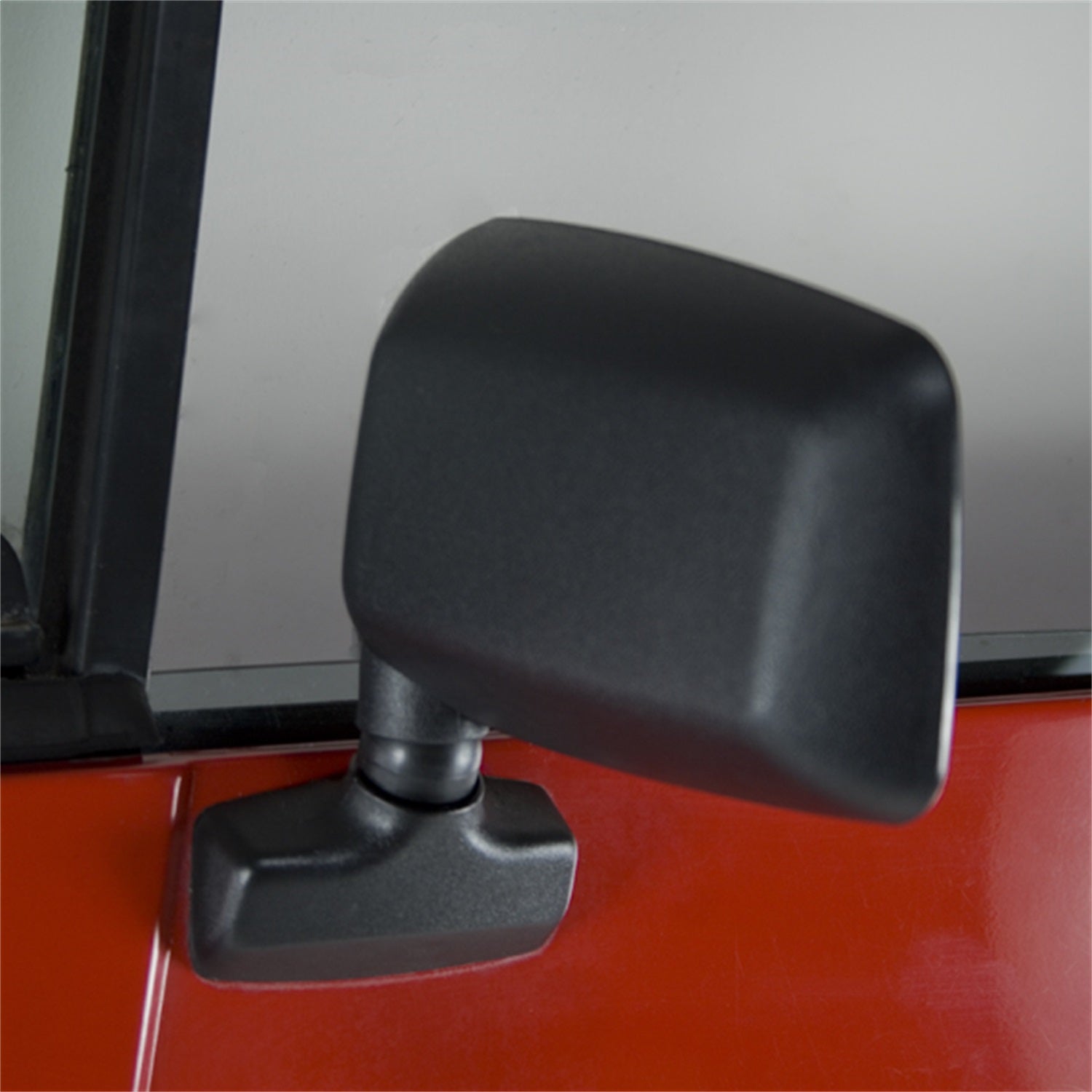 Door Mirror Left Black fits the Driver side of 87-95 Wrangler YJ OMIX