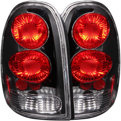 Tail Light Set Clear Lens Black Housing Pair Chrysler Town & Country 1996-2000, Dodge Caravan 1996-2000, Dodge Durango 1998-2003, Plymouth Voyager 1996-2000 AnzoUSA