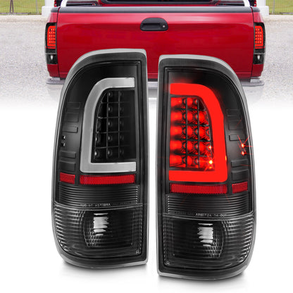 Tail Light Set Clear Lens Pair LED W/ Light Bar Style Black Housing Ford F-150 1997-2003, Ford F-250/F-350/F-450 Super Duty 1999-2007 AnzoUSA