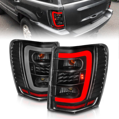 Tail Light Set LED W/ Light Bar Style Black Housing Clear Lens Pair Jeep Grand Cherokee 1999-2004 AnzoUSA