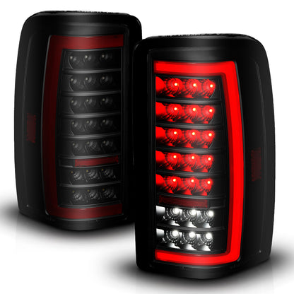 Tail Light Set LED W/ Light Bar Style Black Housing Smoke Lens Pair Chevrolet Suburban 1500/2500/Tahoe 2000-2006, GMC Yukon/XL 1500/XL 2500 2000-2006 AnzoUSA-1