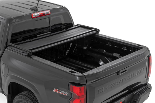 Soft Tri-Fold Bed Cover 5 Foot Bed Chevy/GMC Canyon/Colorado 2WD/4WD (23-26) Rough Country-1