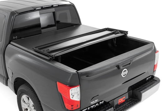 Soft Tri-Fold Bed Cover 5 Foot 7 Inch Bed Nissan Titan 2WD/4WD (2017-2024) Rough Country-1