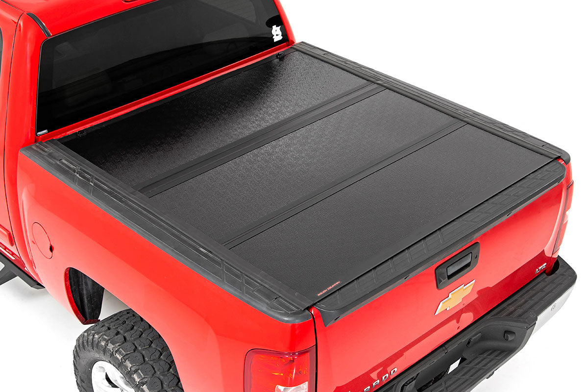Rough Country Low Profile Hard Tri-Fold Tonneau Cover 07-13 1500 5.5 Foot Bed w/Rail Caps Rough Country