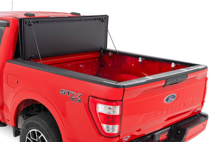 Hard Tri-Fold Flip Up Bed Cover 5 Foot 7 Inch Bed Ford F-150 2WD/4WD (2015-2020) Rough Country-1