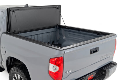 Hard Tri-Fold Flip Up Bed Cover 5 Foot 7 Inch Bed Toyota Tundra 2WD/4WD (07-21) Rough Country-1