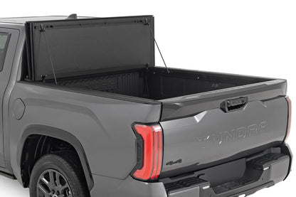 Hard Tri-Fold Flip Up Bed Cover 5 Foot 7 Inch Toyota Tundra 2WD/4WD (2022-2026) Rough Country-1