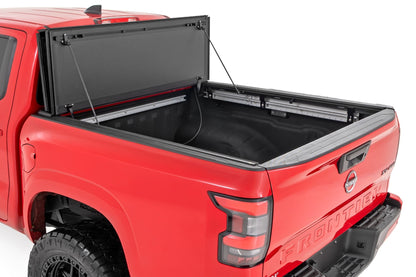 Hard Tri-Fold Flip Up Bed Cover 5 Foot Bed Nissan Frontier 2WD/4WD (22-26) Rough Country-1