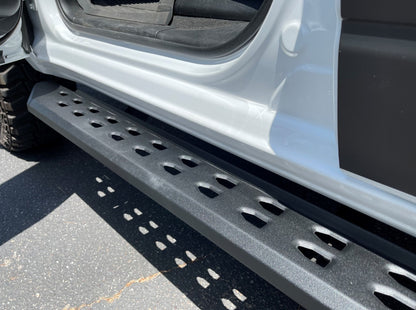 RB10 Slim Line Running Boards With Mounting Brackets Angled Textured Black 2019-2026 Ram 1500 Go Rhino-1