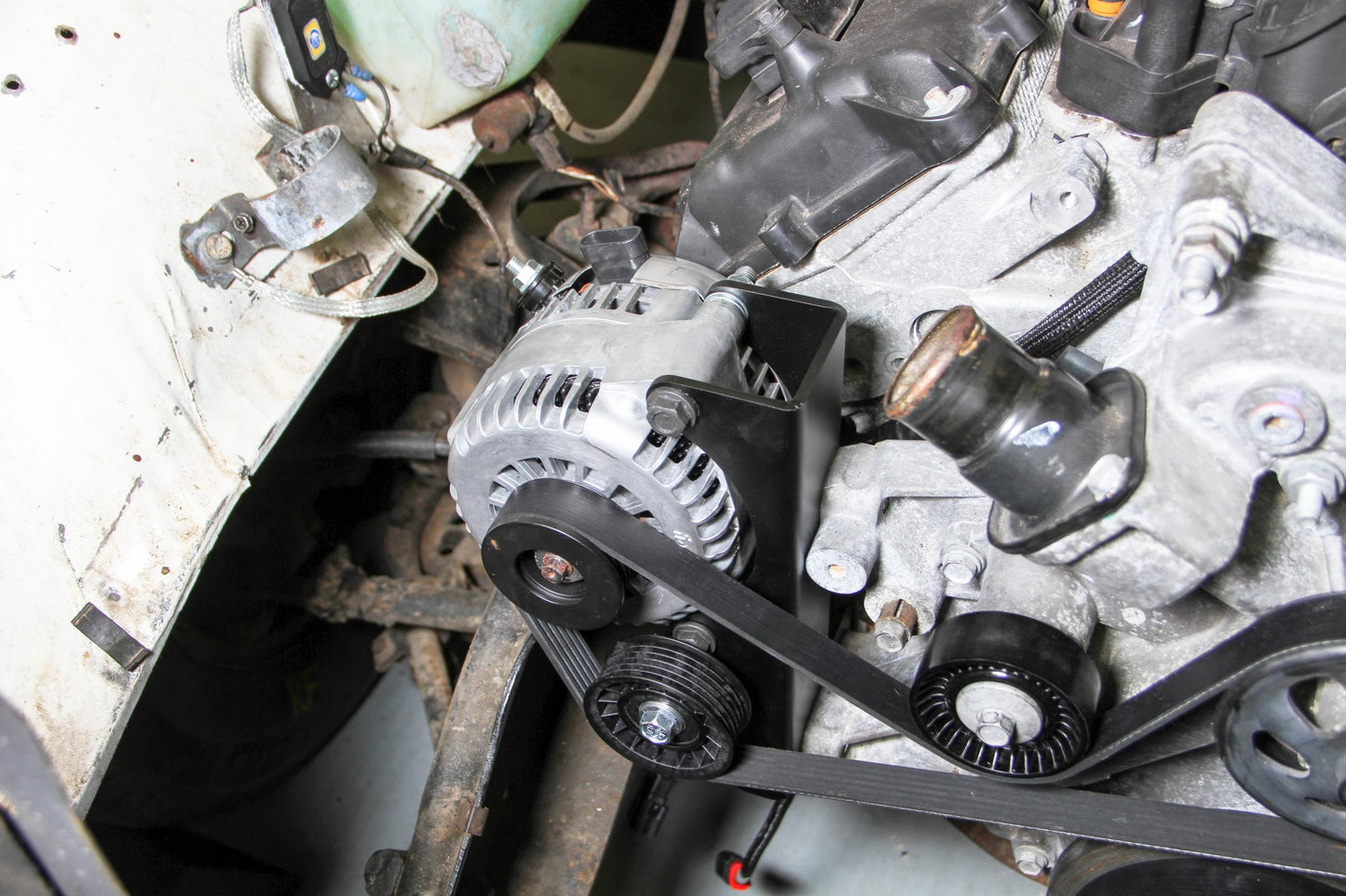Gen III Hemi Alternator Relocation Kit W/ Alternator Moves Alternator Inward for Extra Clearance on Right Side of Engine Includes Alternator 197-302 (150 Amp Output) Black Brackets & Natural Aluminum Alternator Holley-16