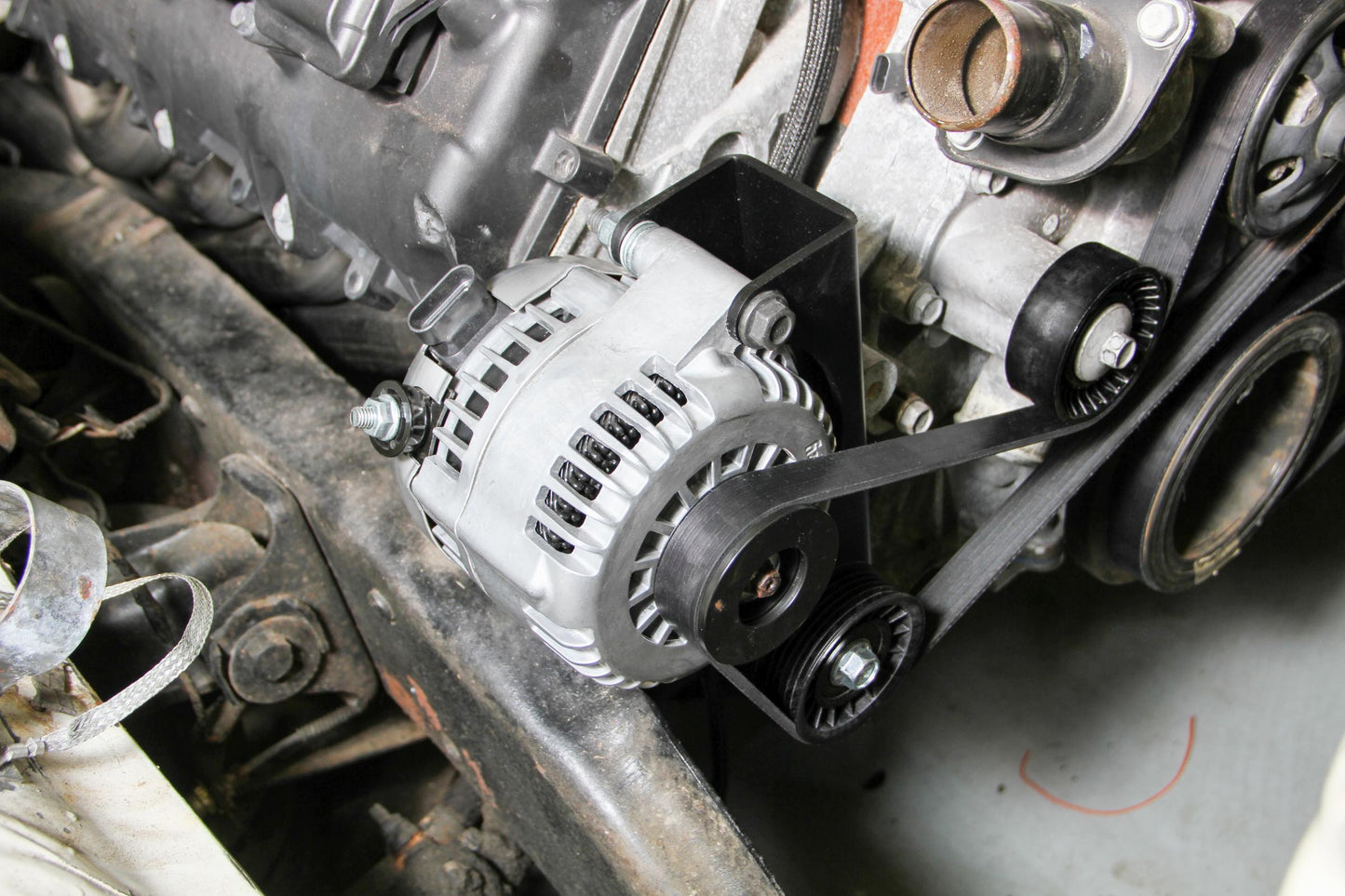 Gen III Hemi Alternator Relocation Kit W/ Alternator Moves Alternator Inward for Extra Clearance on Right Side of Engine Includes Alternator 197-302 (150 Amp Output) Black Brackets & Natural Aluminum Alternator Holley-17
