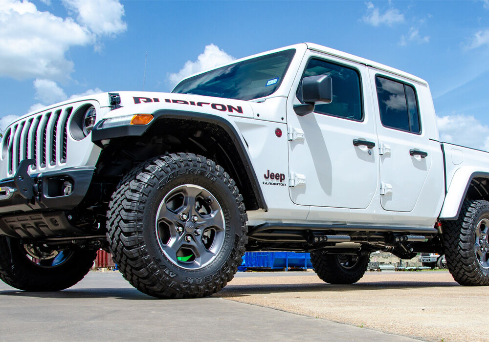 RKR Step System Full Length (1 Step Mount/1 Step per Side) 1.75 Inch Rails 2020-2025 Jeep Gladiator JT 4-Door Textured Black NFab-1