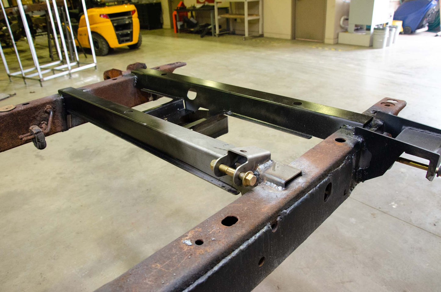 Rust Buster Frameworks Rust Buster Left Rear Shock Mount For 2002-2009 Dodge Ram 1500 RB7727