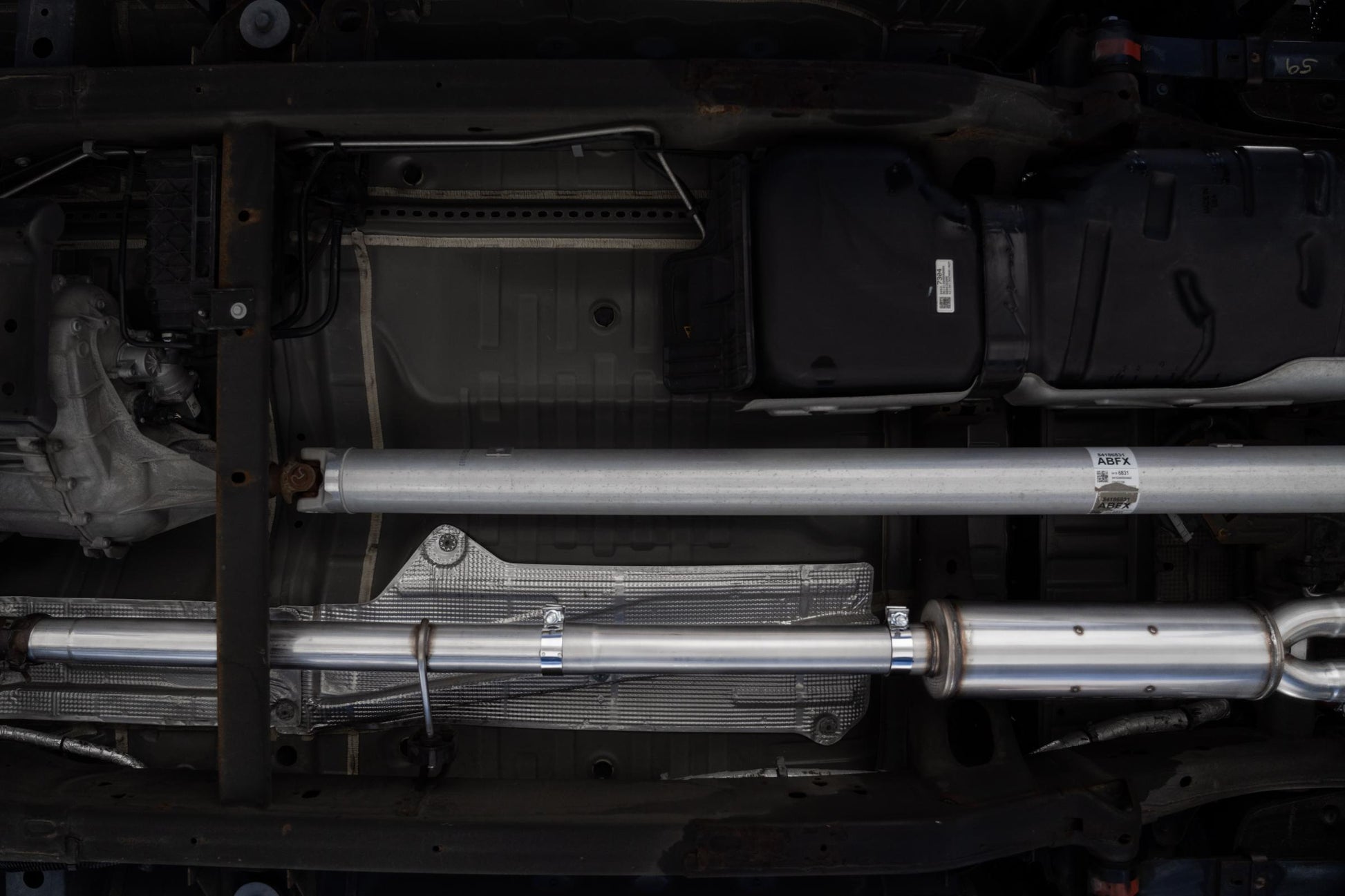 3.0 inch Cat-Back 2.5 inch Dual Split Rear Quad Carbon Fiber Tips 4.0 inch OD Dual Out 19-up Silverado/Sierra 1500 MBRP-2