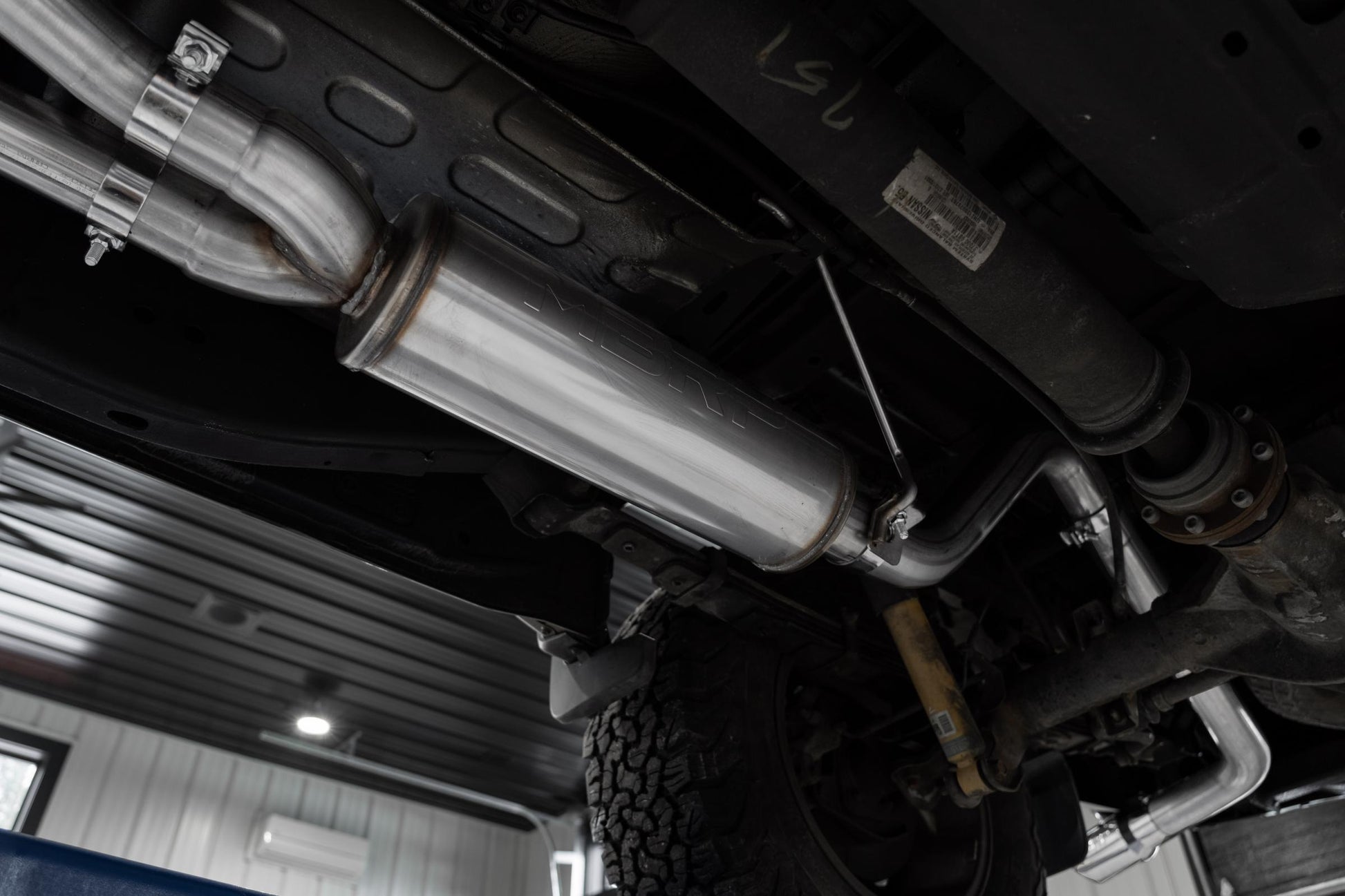 2022-Up Nissan Frontier 3.8L Turn Down Aluminized Steel 2.5 Inch Cat-Back 3 Inch Single High Clearance Rear Exit Armor Lite Series MBRP-1