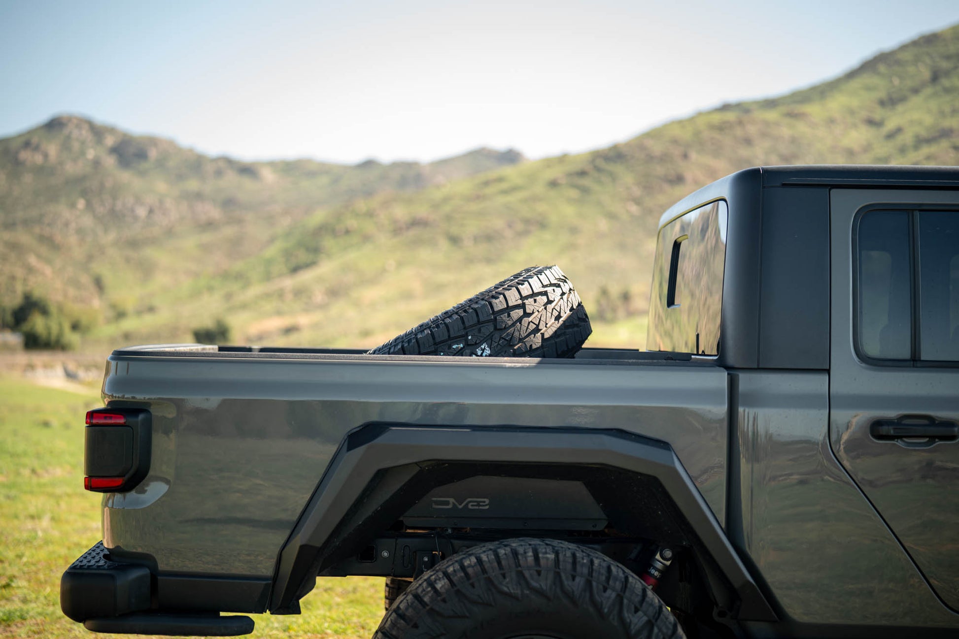 2020 2025 Jeep Gladiator JT Adjustable In Bed Tire Carrier DV8 Offroad-19