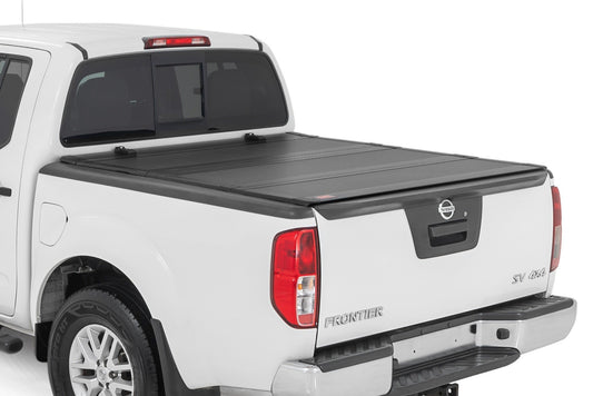 Hard Tri-Fold Flip Up Bed Cover | 5' Bed | Nissan Frontier 2WD/4WD (05-21) Rough Country