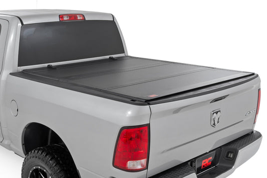 Hard Tri-Fold Flip Up Bed Cover | 5'7" Bed | Ram 1500 2WD/4WD (2010-2018 & Classic) Rough Country