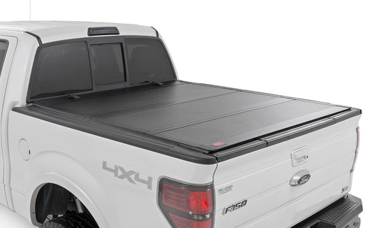 Hard Tri-Fold Flip Up Bed Cover | 5'7" Bed | Ford F-150 2WD/4WD (2004-2014) Rough Country